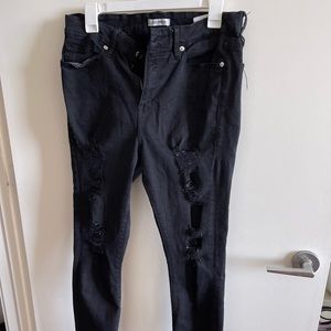 Good American black ripped jeans